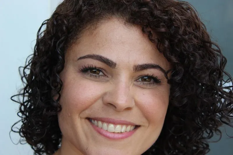 A patient smiling after treatment
